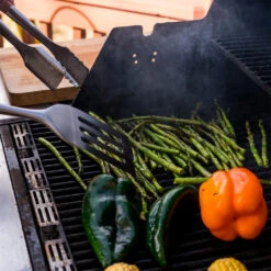 Drip EZ 3-Piece Grilling Tool Set With Stainless Body And Rosewood Handles - Spatula, Tongs, And Fork -BBQGrills Shop Drip EZ 3 Piece Grilling Tool Set with Stainless Body and Rosewood Handles Spatula Tongs and Fork TS 1 Grilling Lifestyle