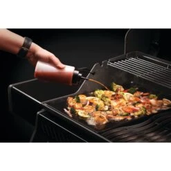 Napoleon 2-Piece 16oz Squeeze Bottles -BBQGrills Shop Low Res JPG 70058 Griddle Squeeze Bottles InUse Option2