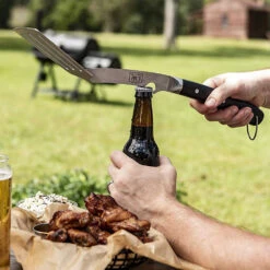 Oklahoma Joe's 2-Piece Gift Set 18-Inch Restaurant-Grade Stainless Steel BBQ Spatula And Tongs -BBQGrills Shop Oklahoma Joes 2 Piece Gift Set 18 Inch Restaurant Grade Stainless Steel BBQ Spatula and Tongs 7826131R06 Lifestyle Bottle Opener