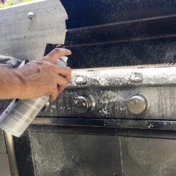 Saber Grills Foaming BBQ Grill Cleaner And Polish - Breaks Up Stains And Grime - 13 Oz. Can -BBQGrills Shop Saber Grills Foaming BBQ Grill Cleaner and Polish Breaks up Stains and Grime 13 Oz Can A00YY5717 Spraying