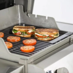 Weber Grills Porcelain-Enameled Cast-Iron Griddle For Spirit II 200/300 & Spirit 200/300 Series Grills -BBQGrills Shop Weber 7658 griddle spiritII placed in grill cooking paninis