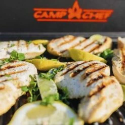 Camp Chef 24-Inch Reversible Cast Iron Grill & Griddle -BBQGrills Shop ex90lw cgg24b beach chicken close up with lemons 2